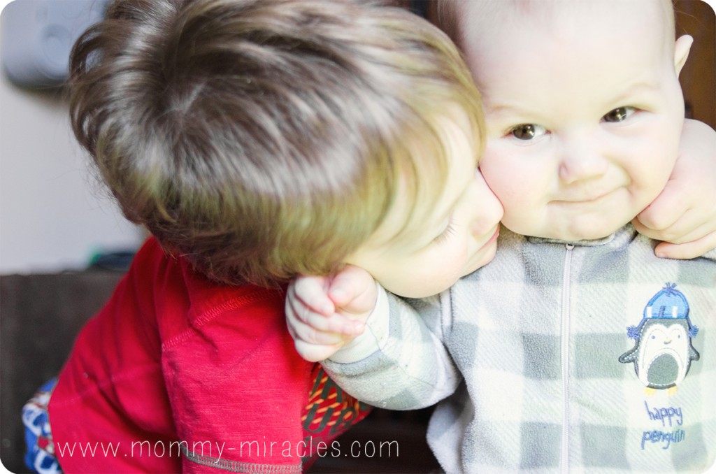 Brothers Kissing