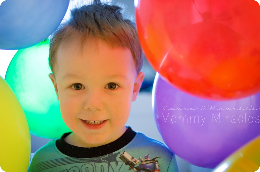 Cameron Through Balloons